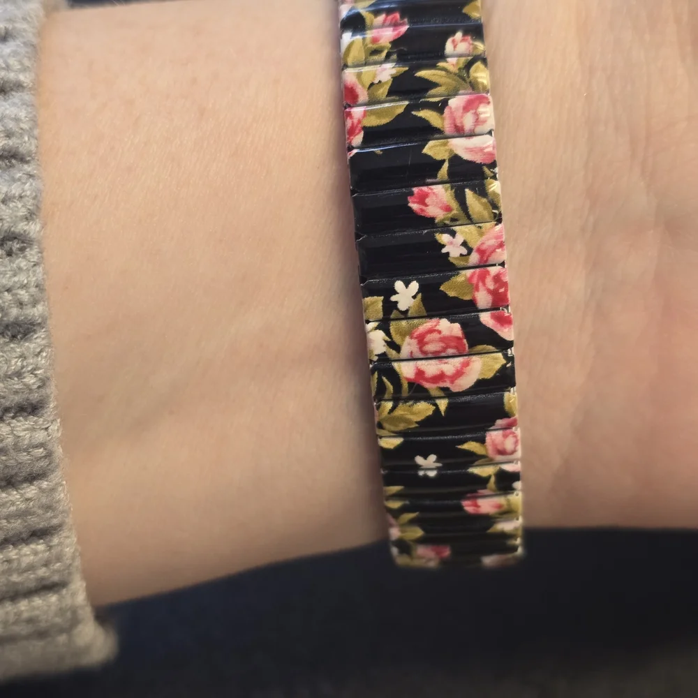 Geneva Black Dial Women's Watch with Floral Stretch Band